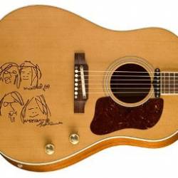 Gibson выпустит три гитары в честь Джона Леннона